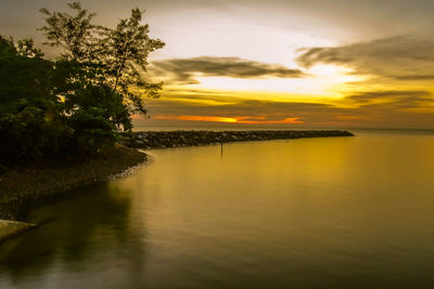 Scenic view of sea against sky during sunset