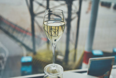 Close-up of wine in glass on table