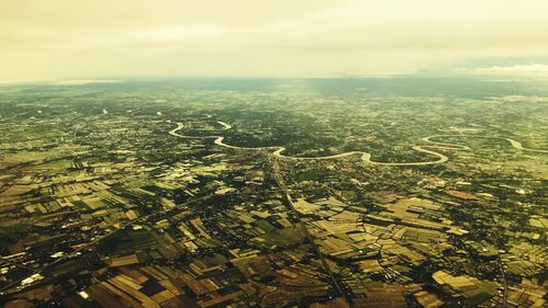 Aerial view of cityscape against sky
