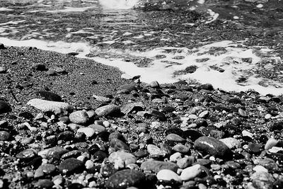 Close-up of pebbles on beach