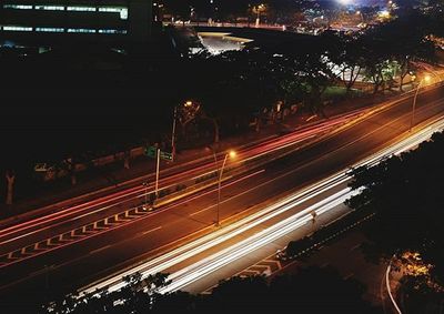 Light trails on city street at night