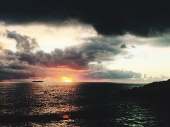 Scenic view of sea against sky during sunset