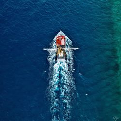 High angle view of people on boat in sea