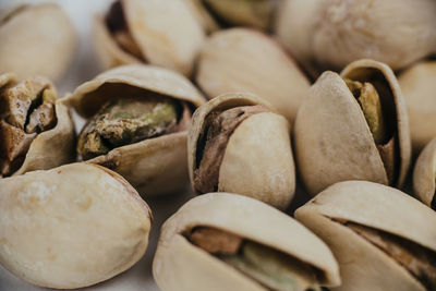 Full frame shot of pistachio over white background