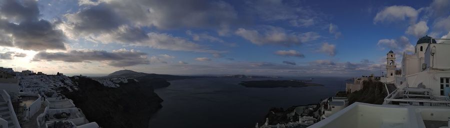 Scenic view of sea against cloudy sky