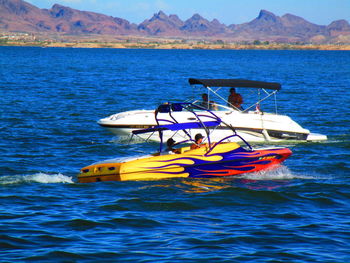 Boat in sea against sky