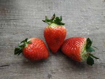 High angle view of strawberries on table