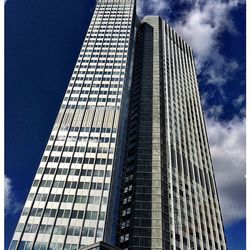 Low angle view of modern building against sky