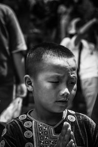 Close-up portrait of boy looking away