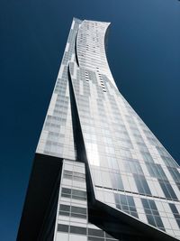 Low angle view of modern building against sky