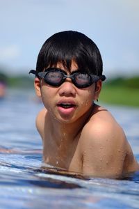 Portrait of boy swimming pool