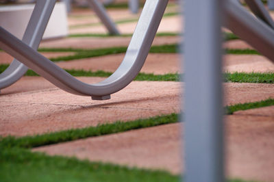 Close-up of bicycle wheel in playground