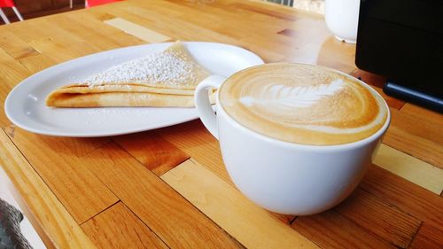 High angle view of coffee on table