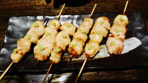 High angle view of meat on barbecue grill