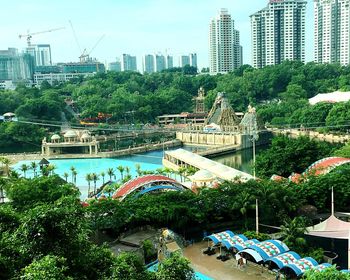 High angle view of city by river