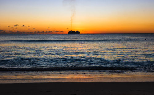 Scenic view of sea against sky during sunset