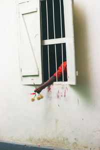 Clothes drying on window of building