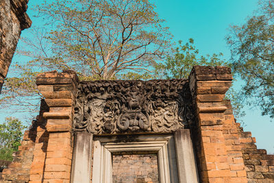 Low angle view of old building against sky