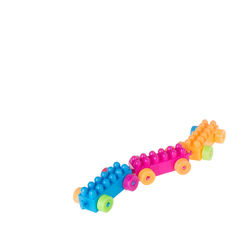 Close-up of multi colored toy over white background