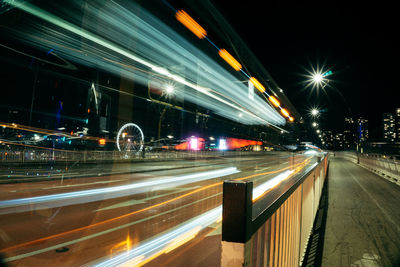 Light trails on city street at night