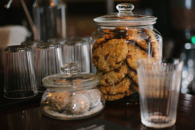 Close-up of drink in glass jar on table