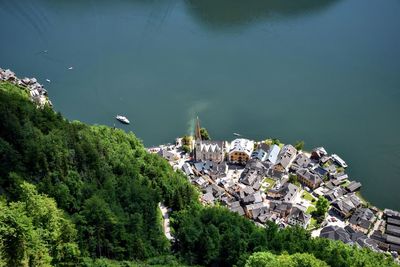 High angle view of houses by lake