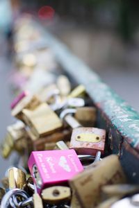 Close-up of padlocks on metal