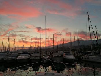 Boats against sky during sunset