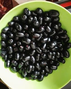 High angle view of blueberries in bowl