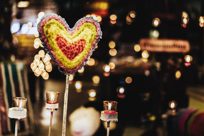 Close-up of heart shape made from glass