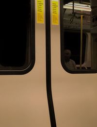 Close-up of yellow train window