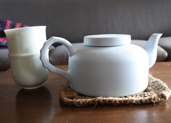 Close-up of coffee cup on table