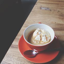 Close-up of coffee cup on table