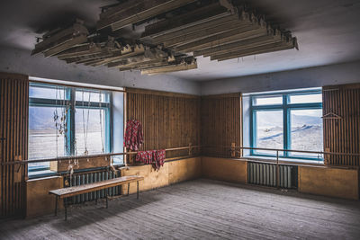 Abandoned gym in the arctic ghost town of pyramiden, svalbard