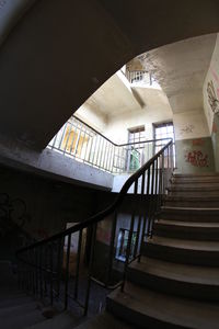 Low angle view of spiral staircase in building