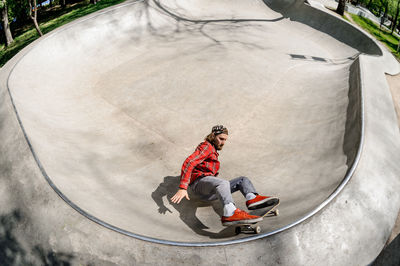 High angle view of boy on skateboard