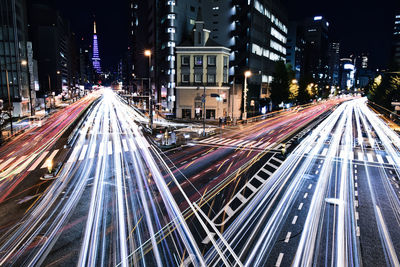 High angle view of light trails on city street at night