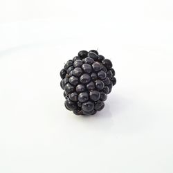 High angle view of blueberries against white background