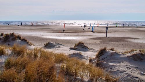 Scenic view of beach against sky