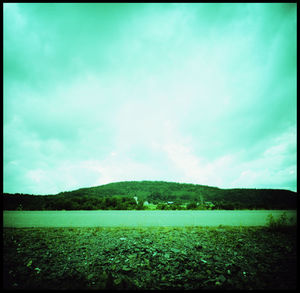 Scenic view of field against sky