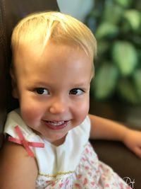 Portrait of cute boy smiling