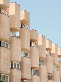 Low angle view of building against clear blue sky