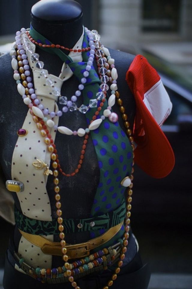 focus on foreground, tradition, celebration, cultures, close-up, multi colored, decoration, celebration event, indoors, hanging, fashion, incidental people, textile, person, still life, hat, day, art and craft