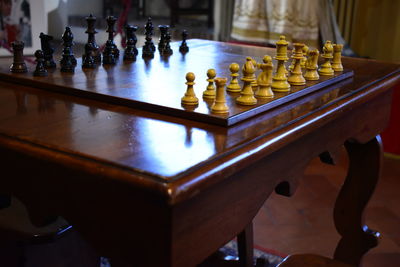 Chess pieces on table at home