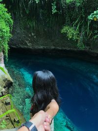 Portrait of woman swimming in pool