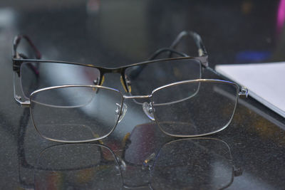 Close-up of eyeglasses on table