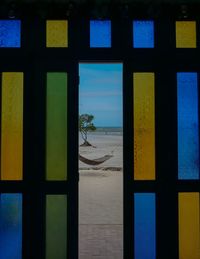 Scenic view of sea seen through window