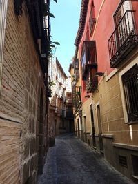 Alley amidst buildings in town