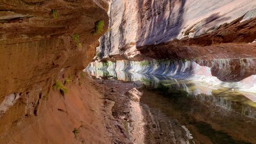 Panoramic view of rock formation amidst water