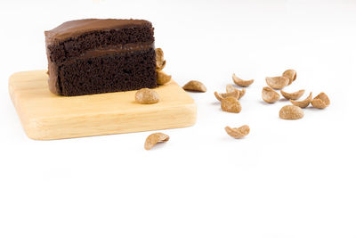 Close-up of cake against white background